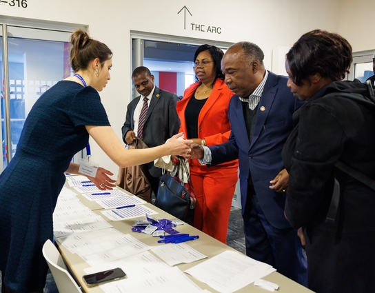 People checking in at a event