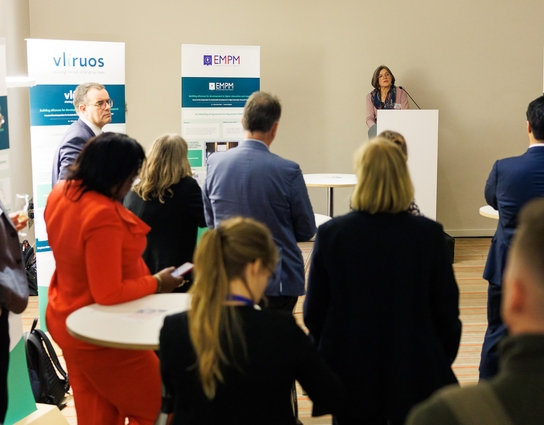 People at a conference during a poster session